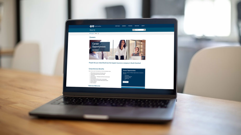 Laptop open with careers website 